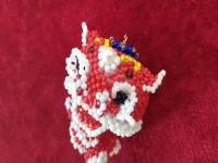 7月25日，在家可以做的工作，拿回家做的手工項目，做手工傳承官，與手工之家合作，因為看好這里、相信這里，圖為串珠米珠繡純手工產(chǎn)品剪影